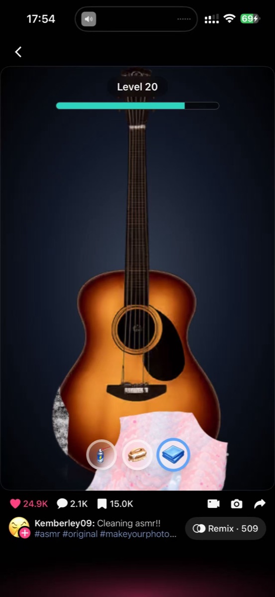Loopit Cleaning ASMR Level 20 guitar with the progress bar near the top and cleaning tools below.